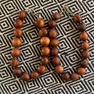 Two Brown Wooden Bead Bracelets